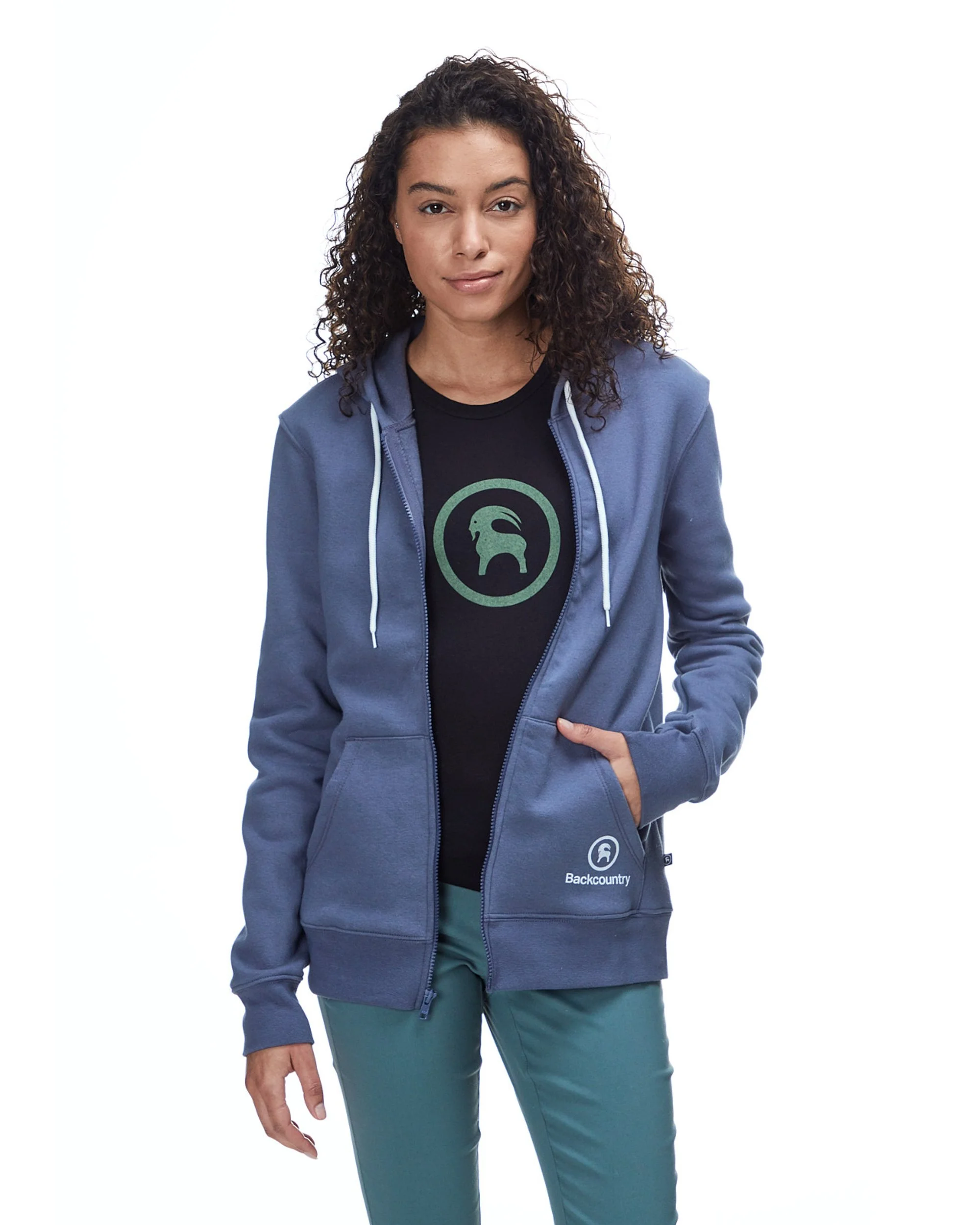 Woman wearing a blue Backcountry zip hoodie over a Backcountry logo tee — apparel product photography by BK Captured