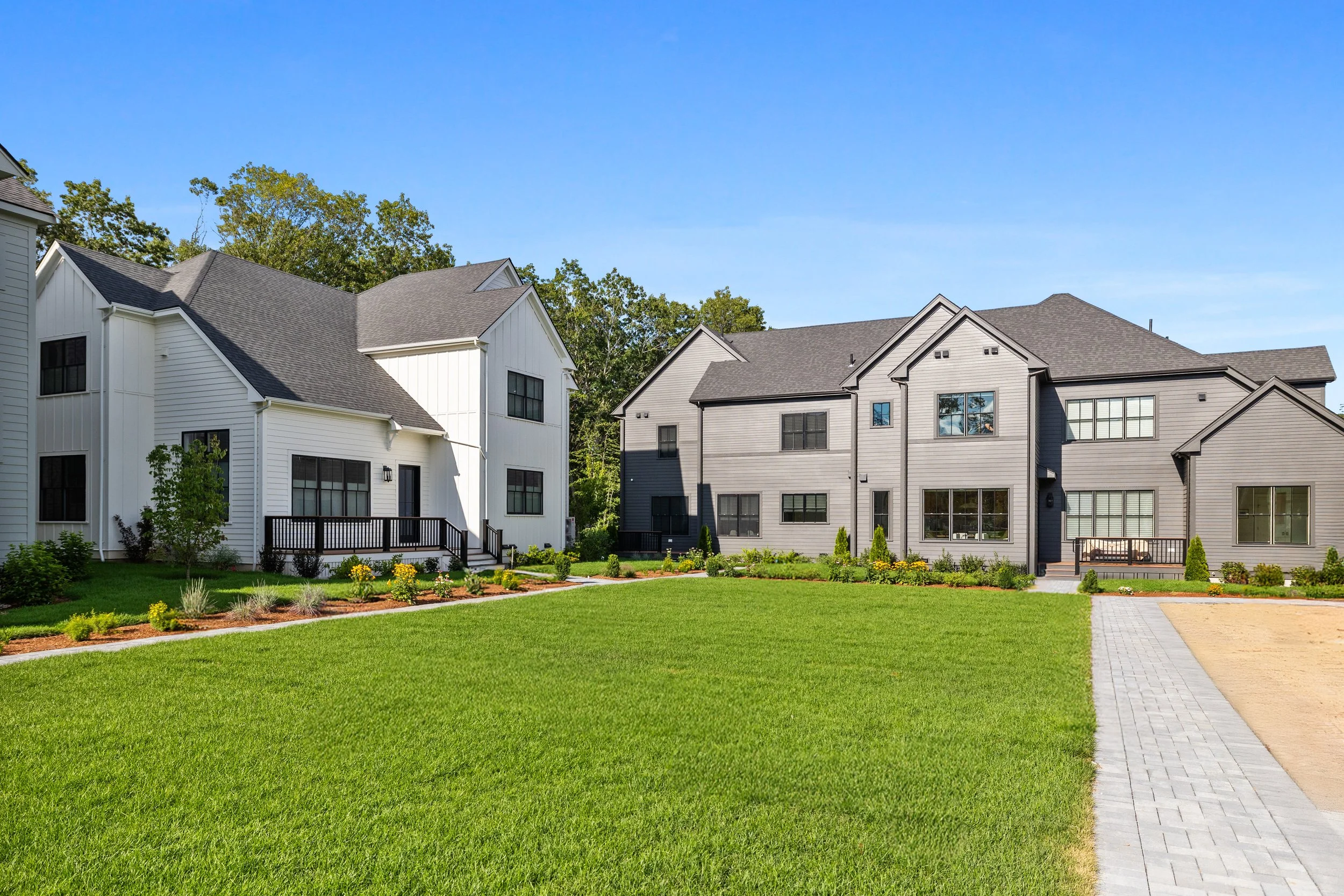 Rear view of the courtyard and back of the homes at Fairland Commons in Lexington, MA
