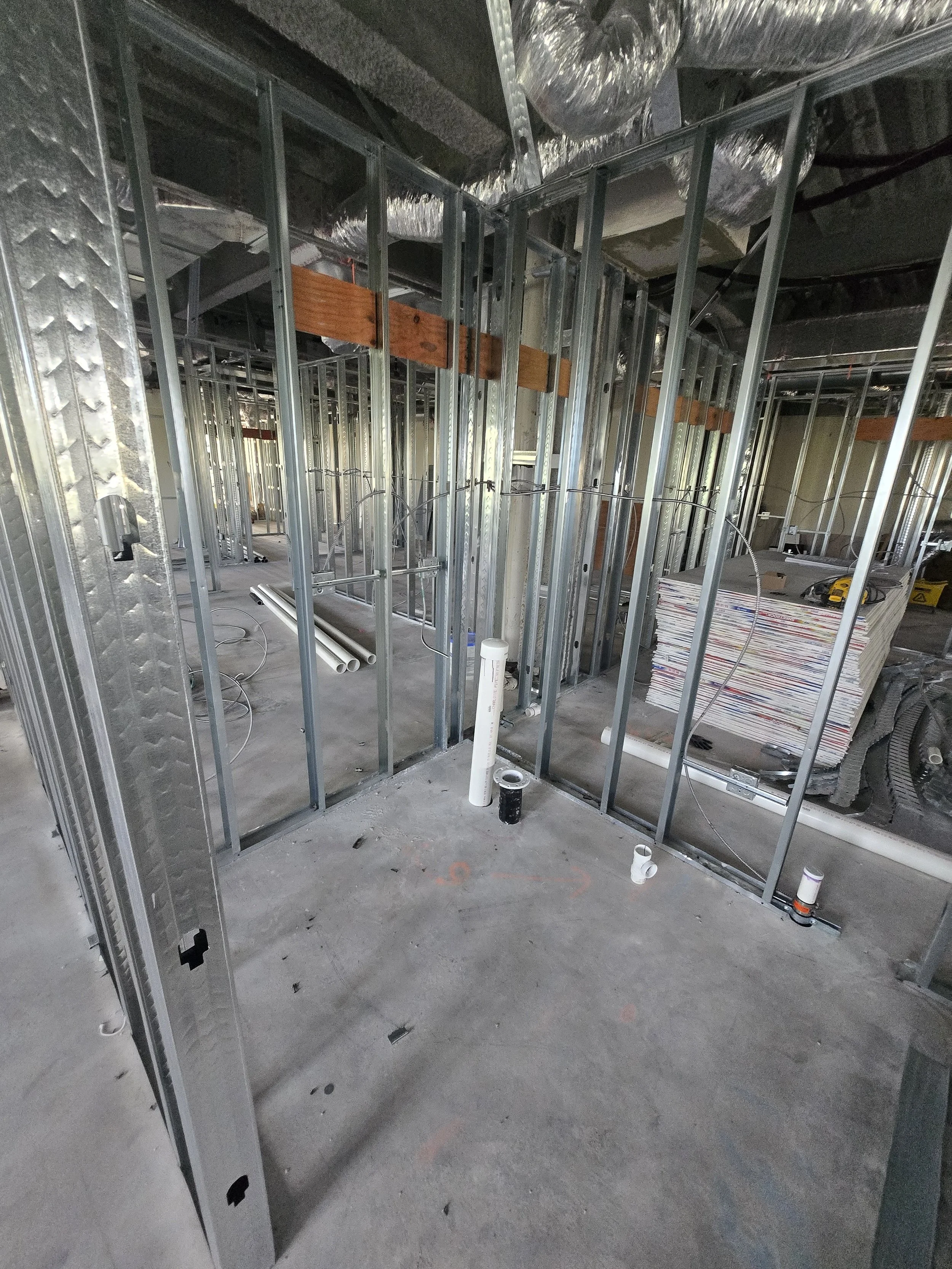 framing and backing installation at new restrooms