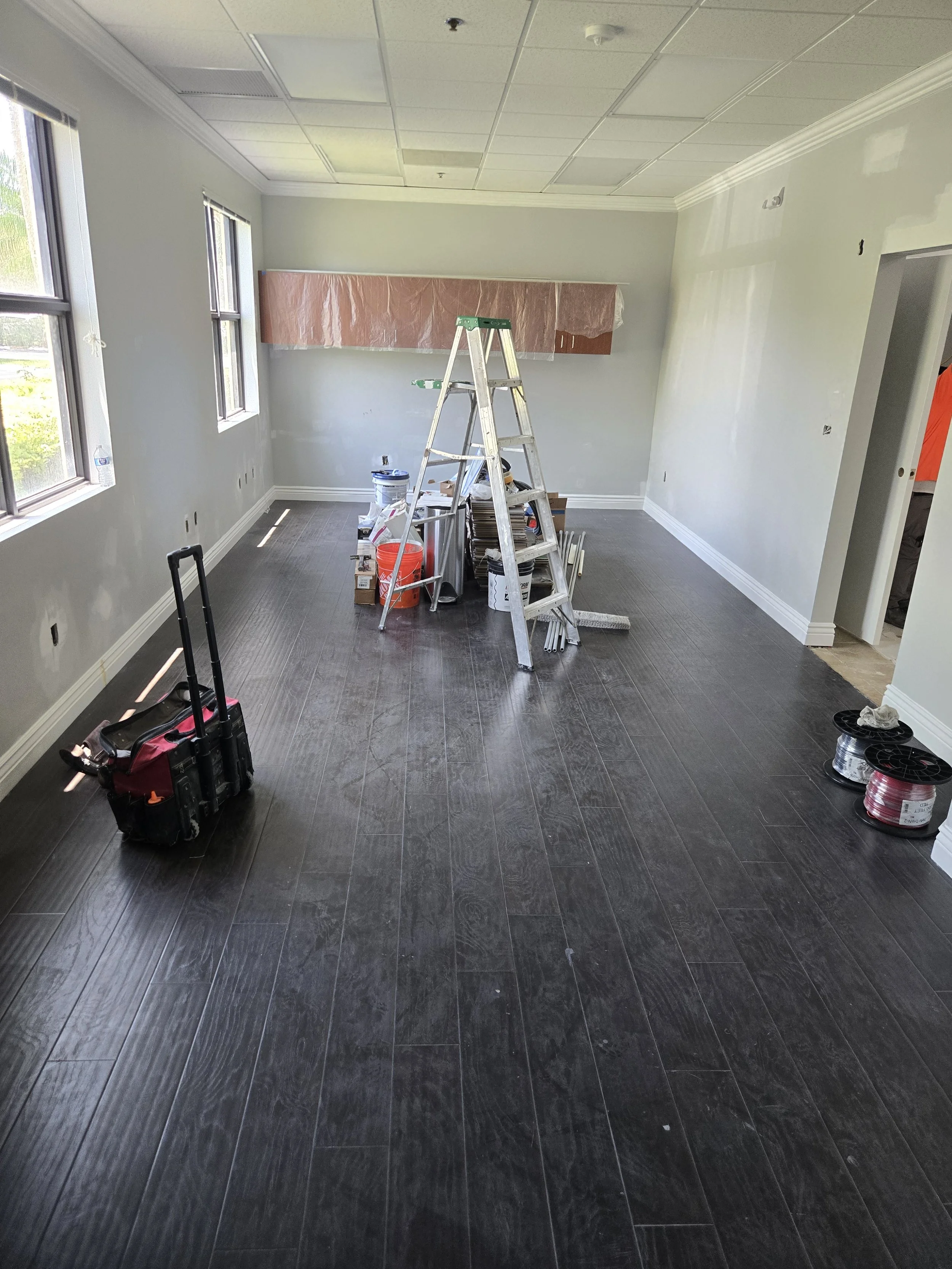 Painting after installing new air conditioning units, demo and repair ceilings.