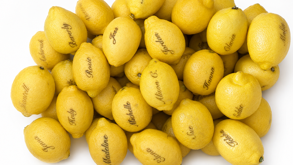 70 laser engraved monogrammed lemons for the Rosie Assoulin x Target launch