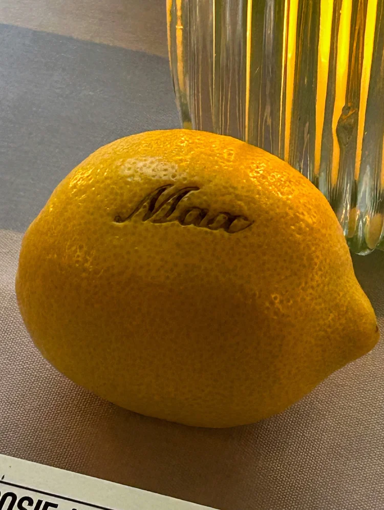 Lemon engraved with the name Max at the Rosie Assoulin x Target dinner