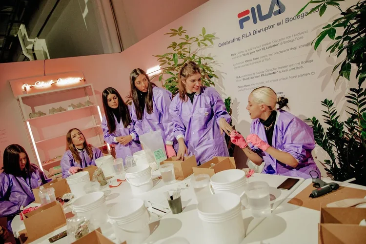 Leading the workshop demonstration at the table