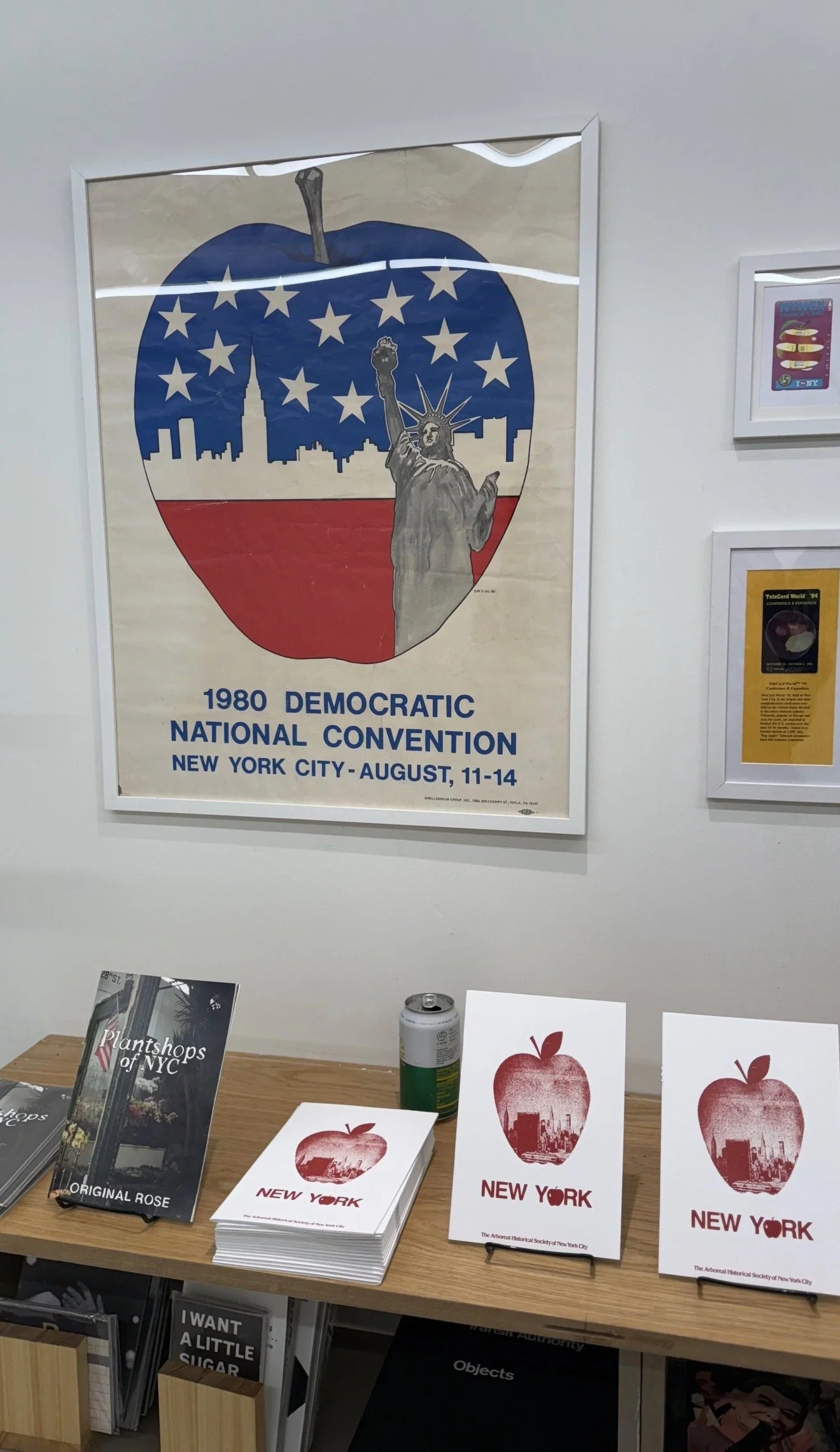 Poster for the 1980 Democratic National Convention in New York City, featuring an apple with the Statue of Liberty and city skyline inside it, with stars and stripes in the background.