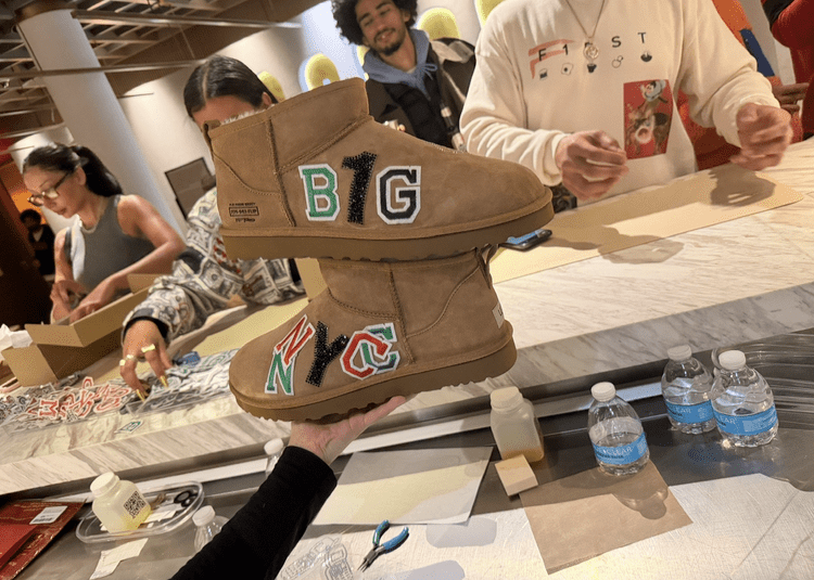Boots customized with colorful letter patches at a live patch bar in NYC