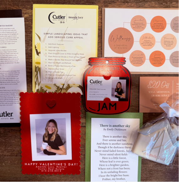 A collection of printed cards, a red “jam” ornament, a treat bag, and two photos of Amanda Lucy holding a coffee cup.