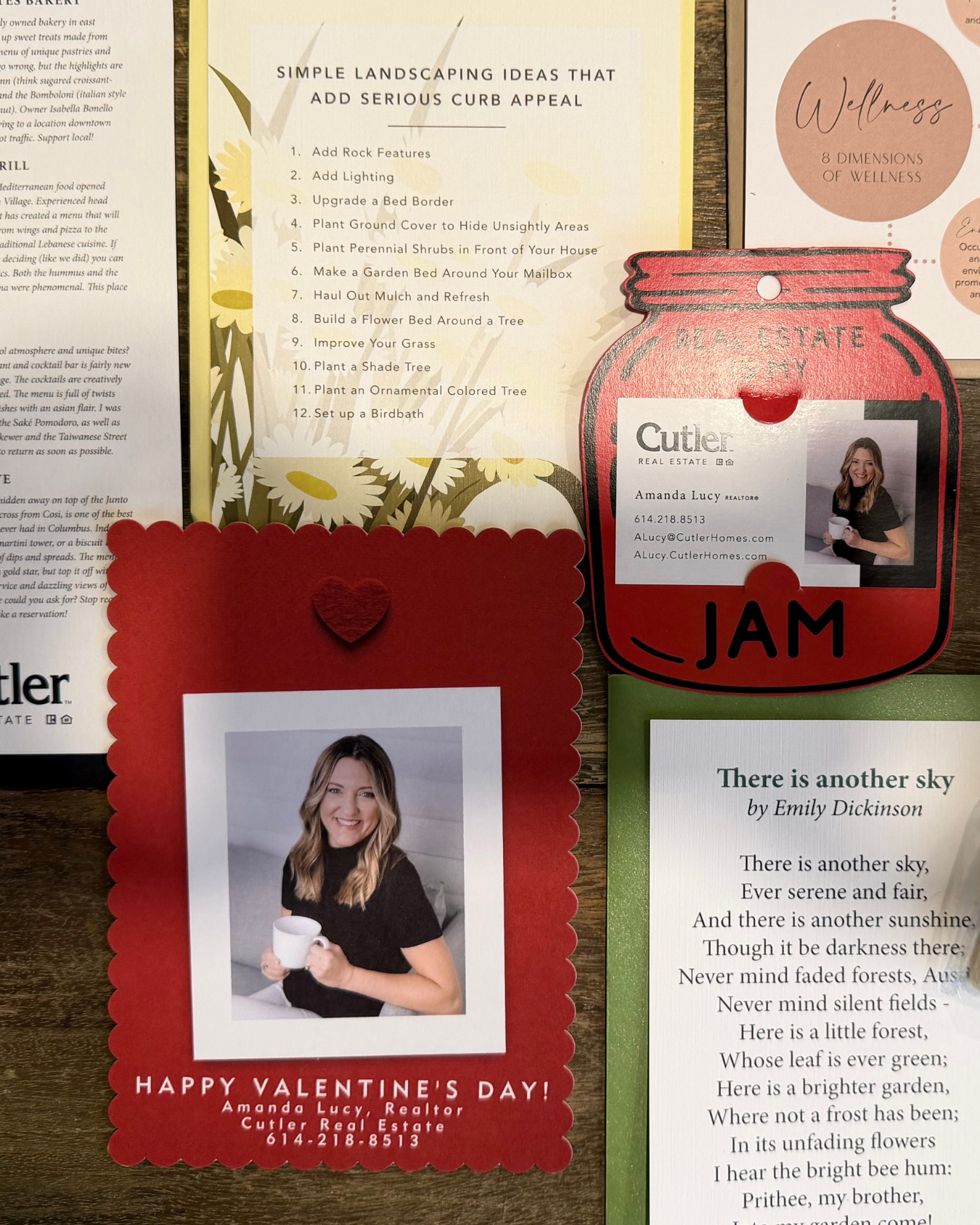 Columbus Ohio Real Estate that gives valentine's day cards with a woman's photo, a realtor badge, a poem, landscaping tips, and a "Jam" cut-out on a table.