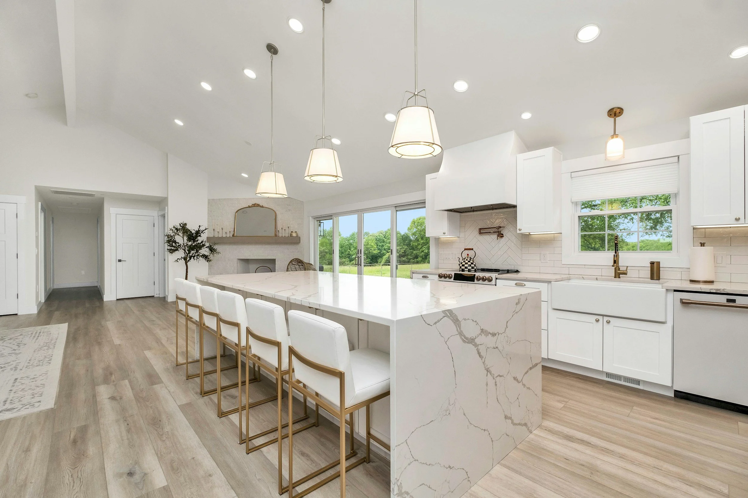 Custom kitchen remodeling featuring a bright, modern kitchen with island seating and designer finishes.