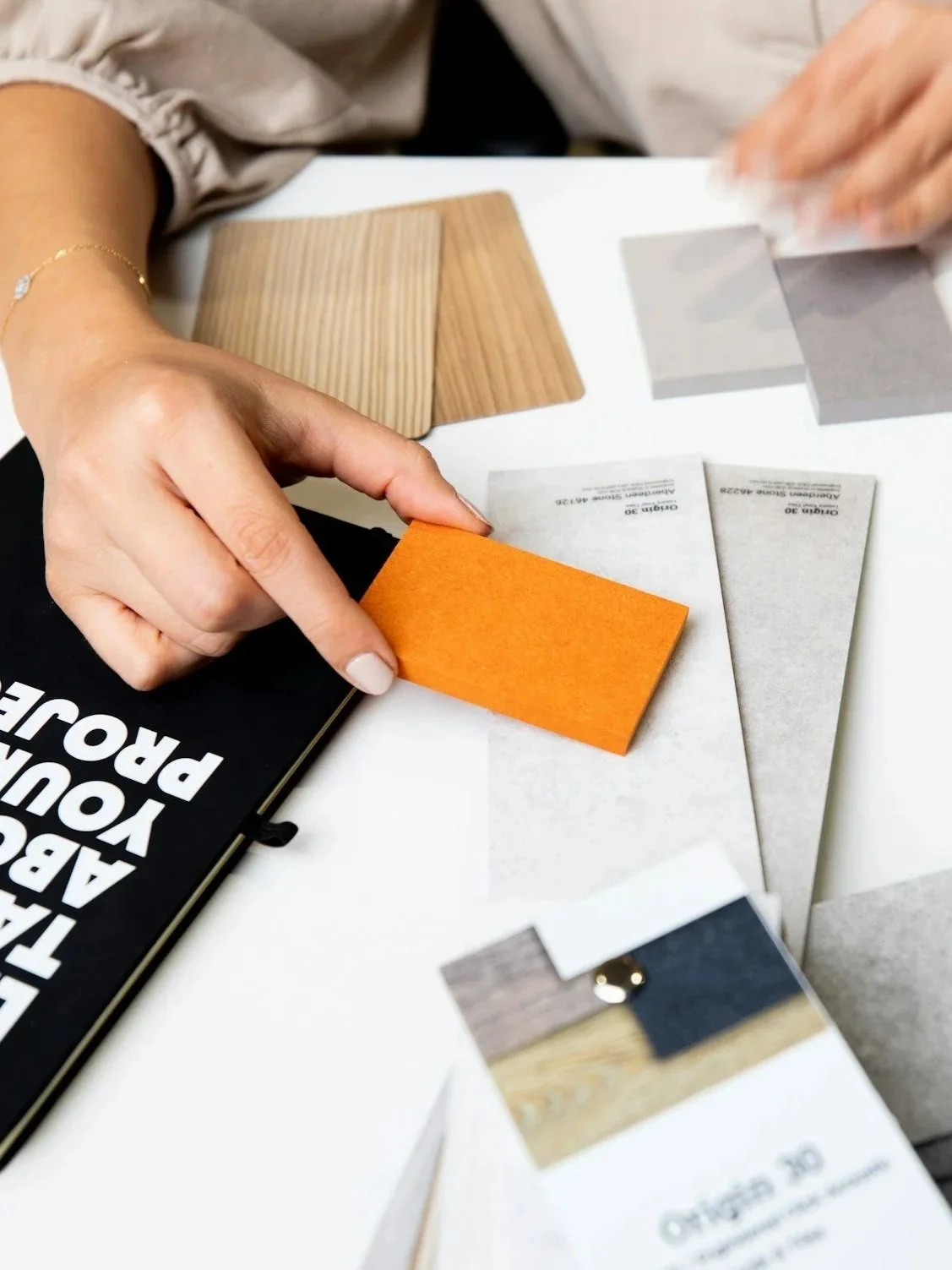 Finalizing kitchen and bath design with material and finish selections during the planning process.