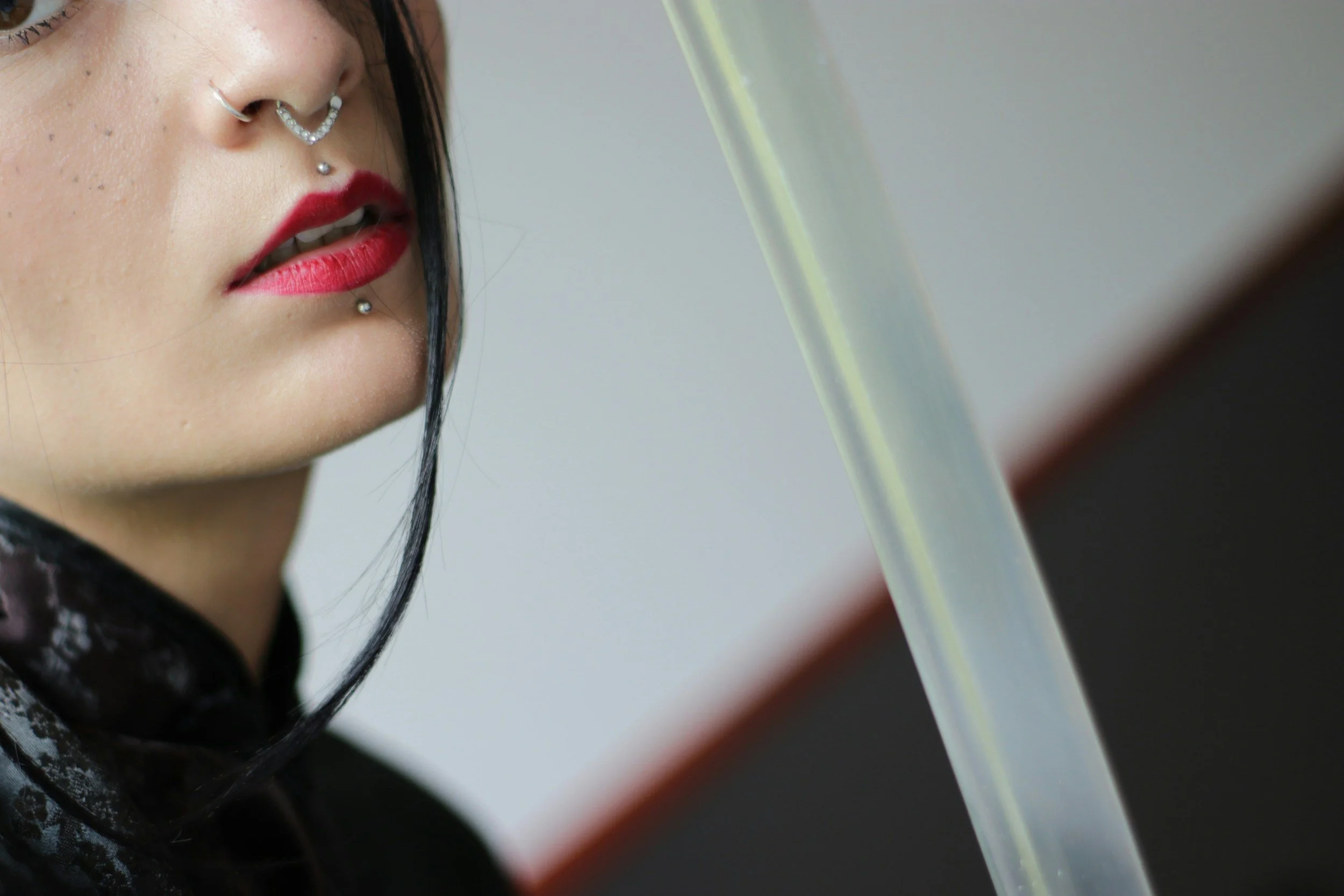 Professional septum and facial piercing techniques taught in body piercing training