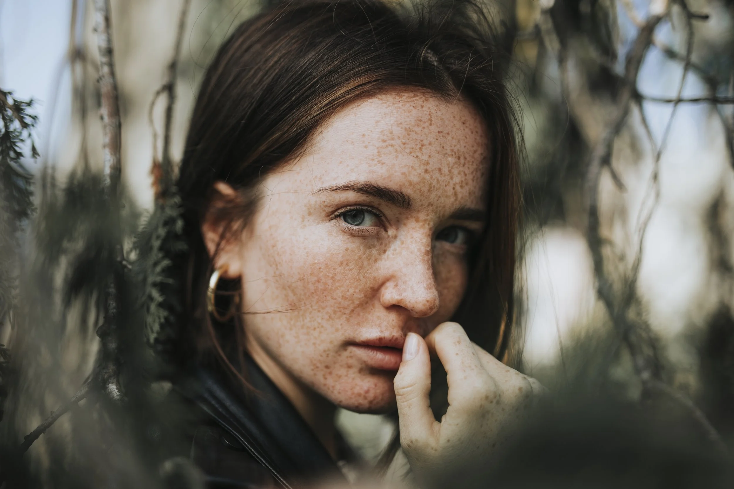 Exhausted woman reflecting on patterns of self-abandonment