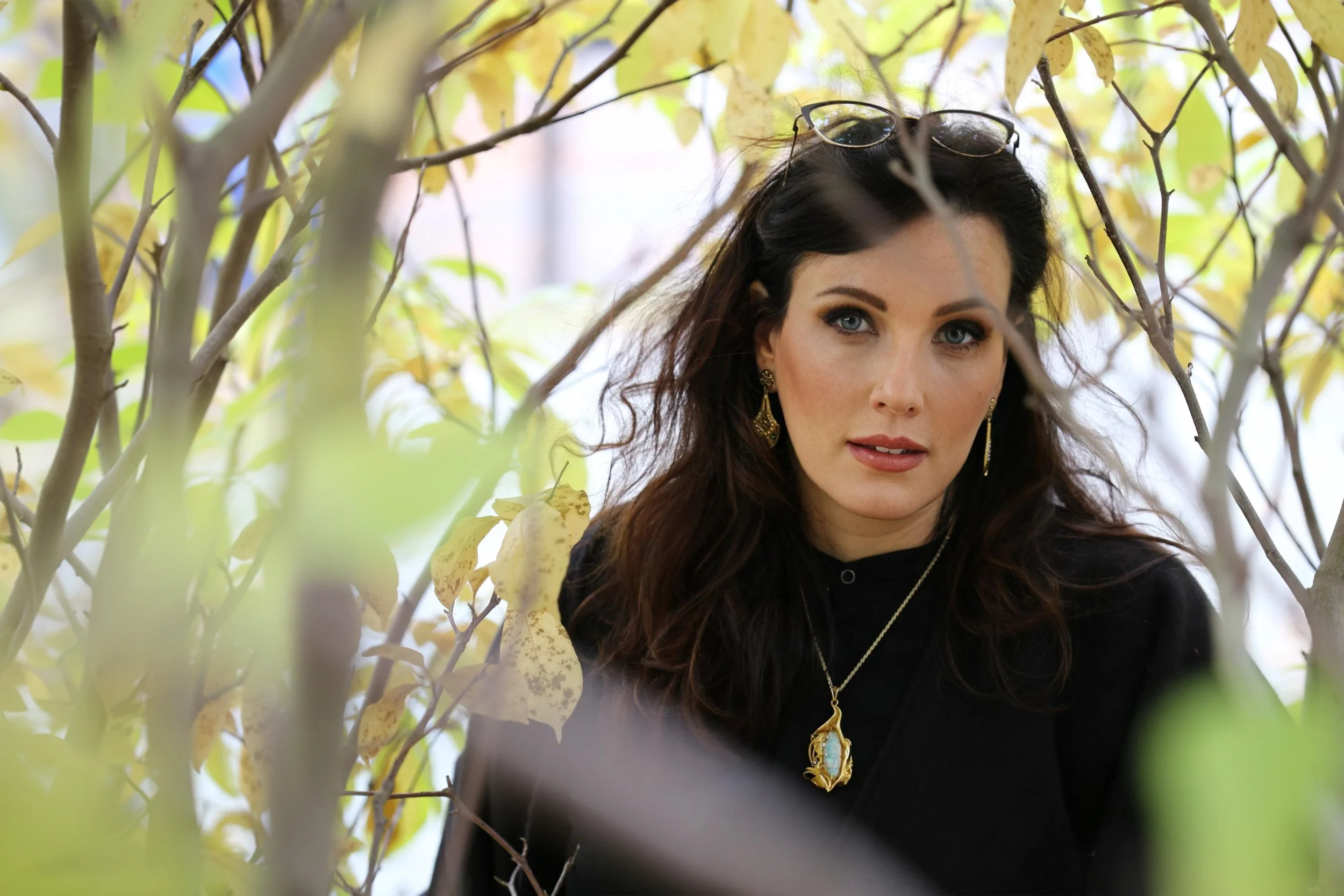 Adrienne Durst Montreal psychotherapist portrait outdoors among autumn leaves