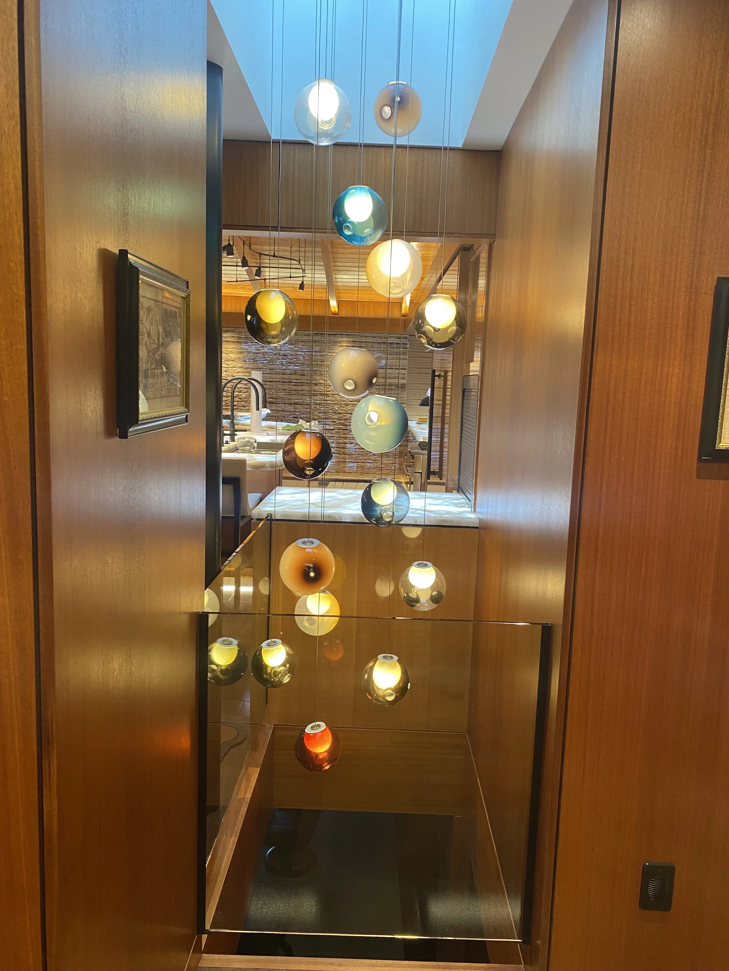 Photo of a Nordea Homes job showing an image of a kitchen with an ornate glass chandelier