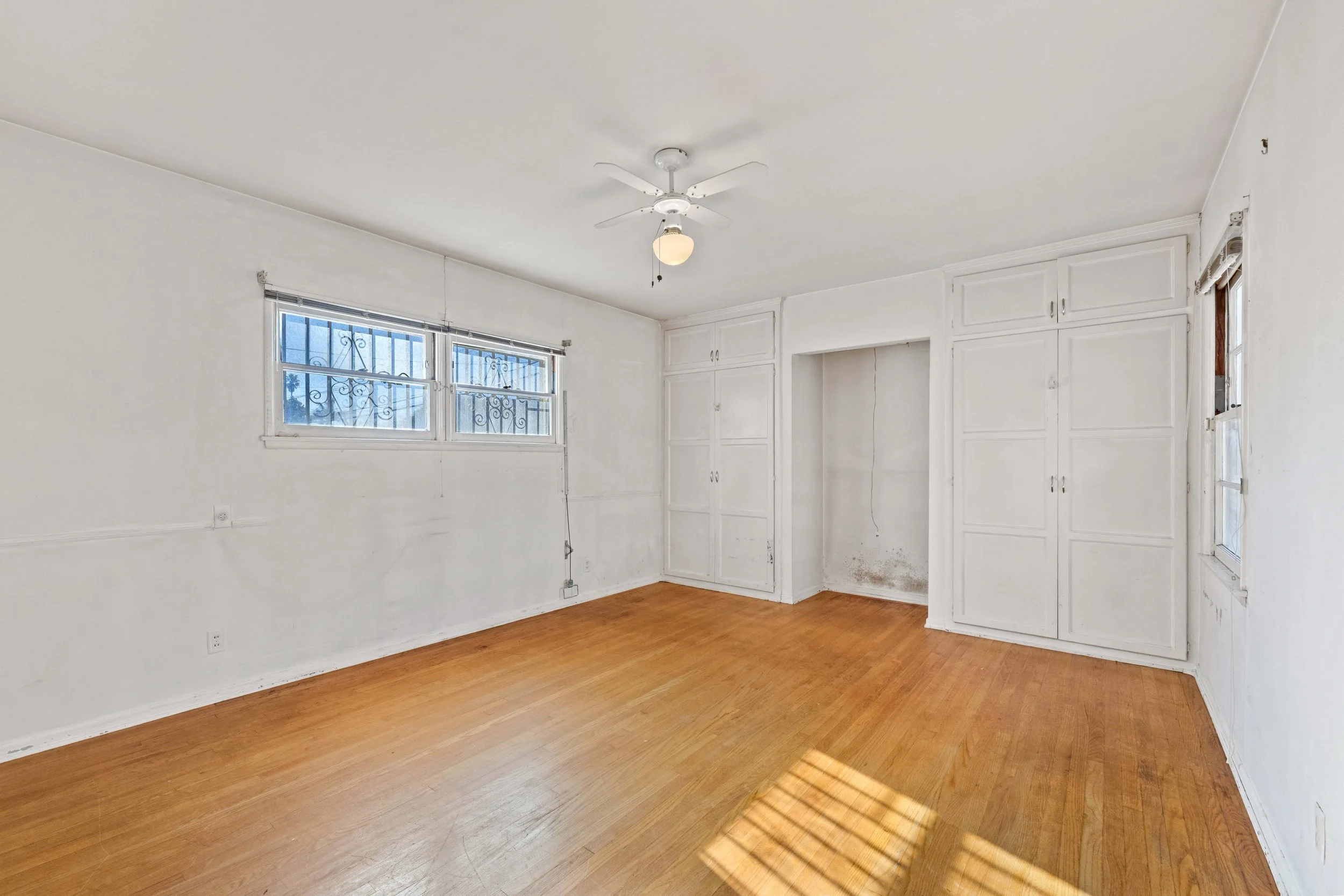 Primary Bedroom with View of Closets