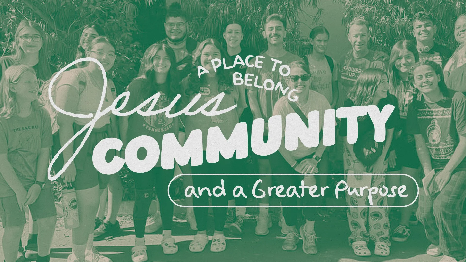 A group of people standing outdoors in front of trees, with the overlay text 'A place to belong, Jesus community, and a greater purpose'.