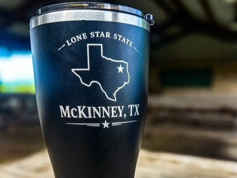 Custom engraved tumbler featuring a Texas design and McKinney, TX personalization.