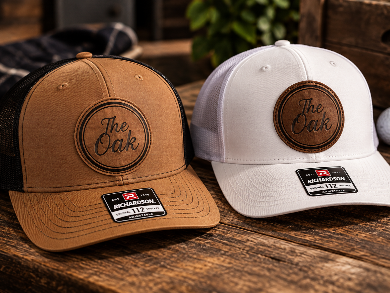Custom Richardson hats with laser-engraved leatherette patches featuring The Oak logo.