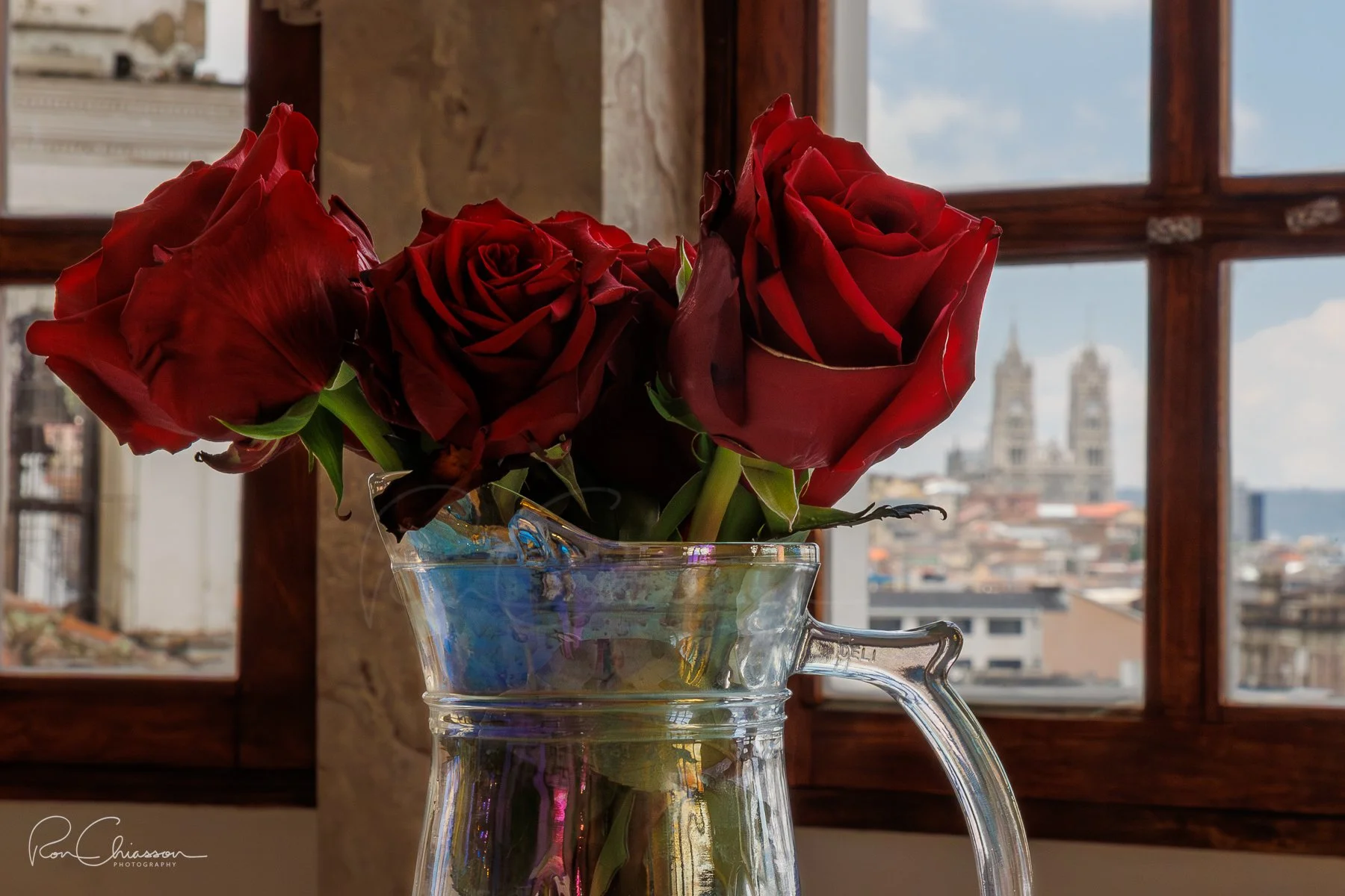 pitcher with roses and the basilica in the window. ©Ron Chiasson Photography @rsonphoto.