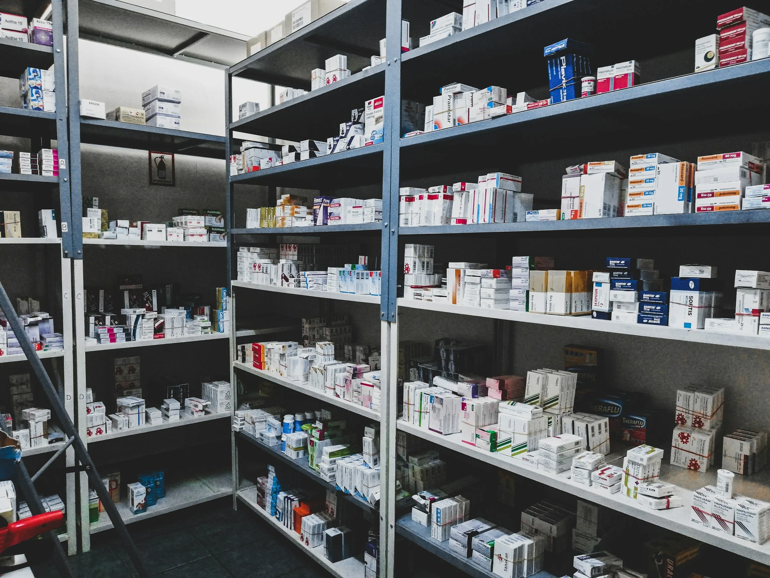 Shelves with various medicines in a pharmacy