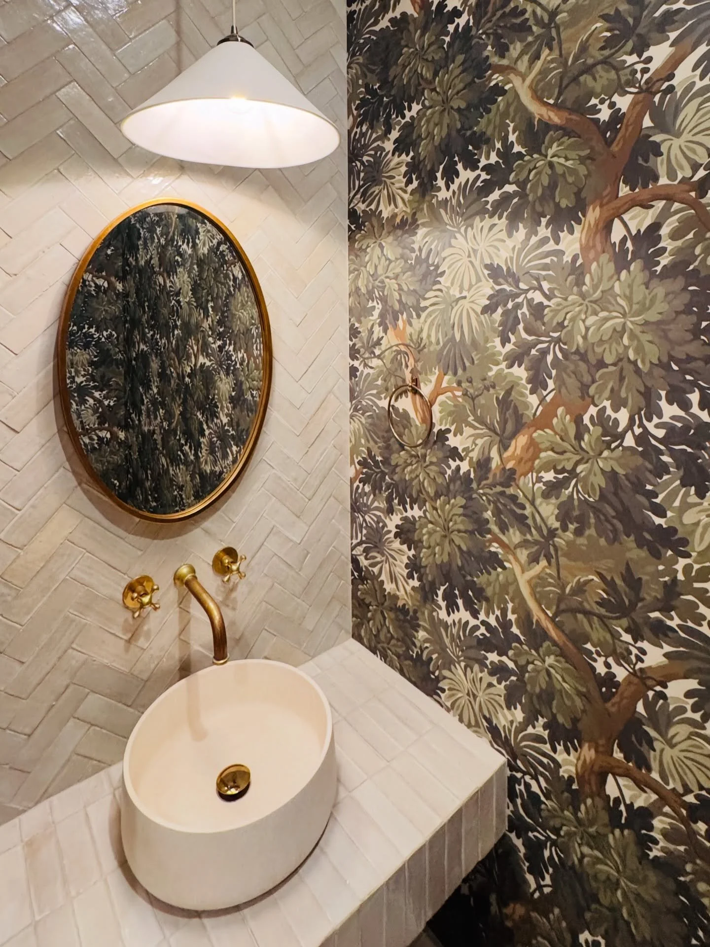 Into the forest, without leaving the room.

We installed House of Hackney &ndash; &ldquo;Foris Magna&rdquo; (Verdure) in this powder bath, wrapping the space in a rich canopy of hand-painted oaks. The depth, movement, and scale of this pattern turn a