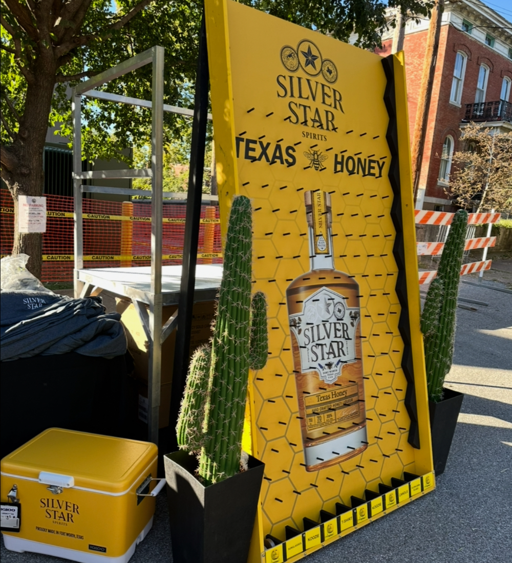 Branded outdoor game display used for promotional marketing and consumer engagement.
