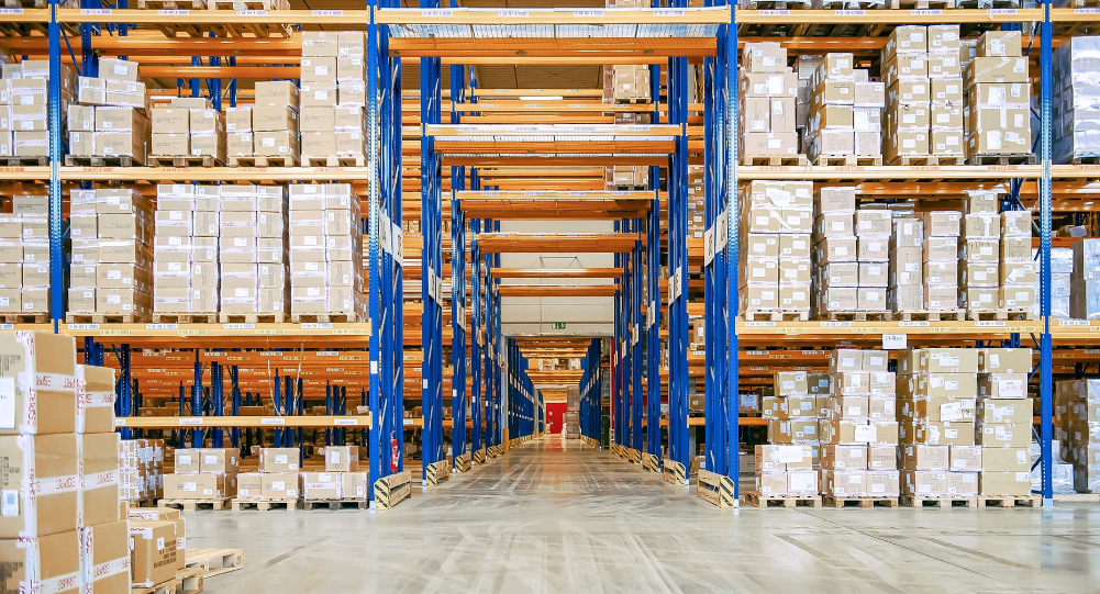 Warehouse storage area managing inventory of branded packaging and materials.