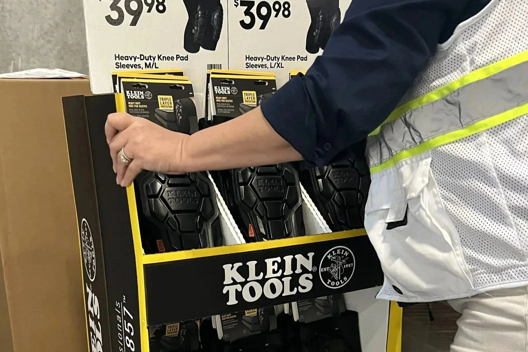 Assembly line preparing POS displays and branded packaging for distribution.