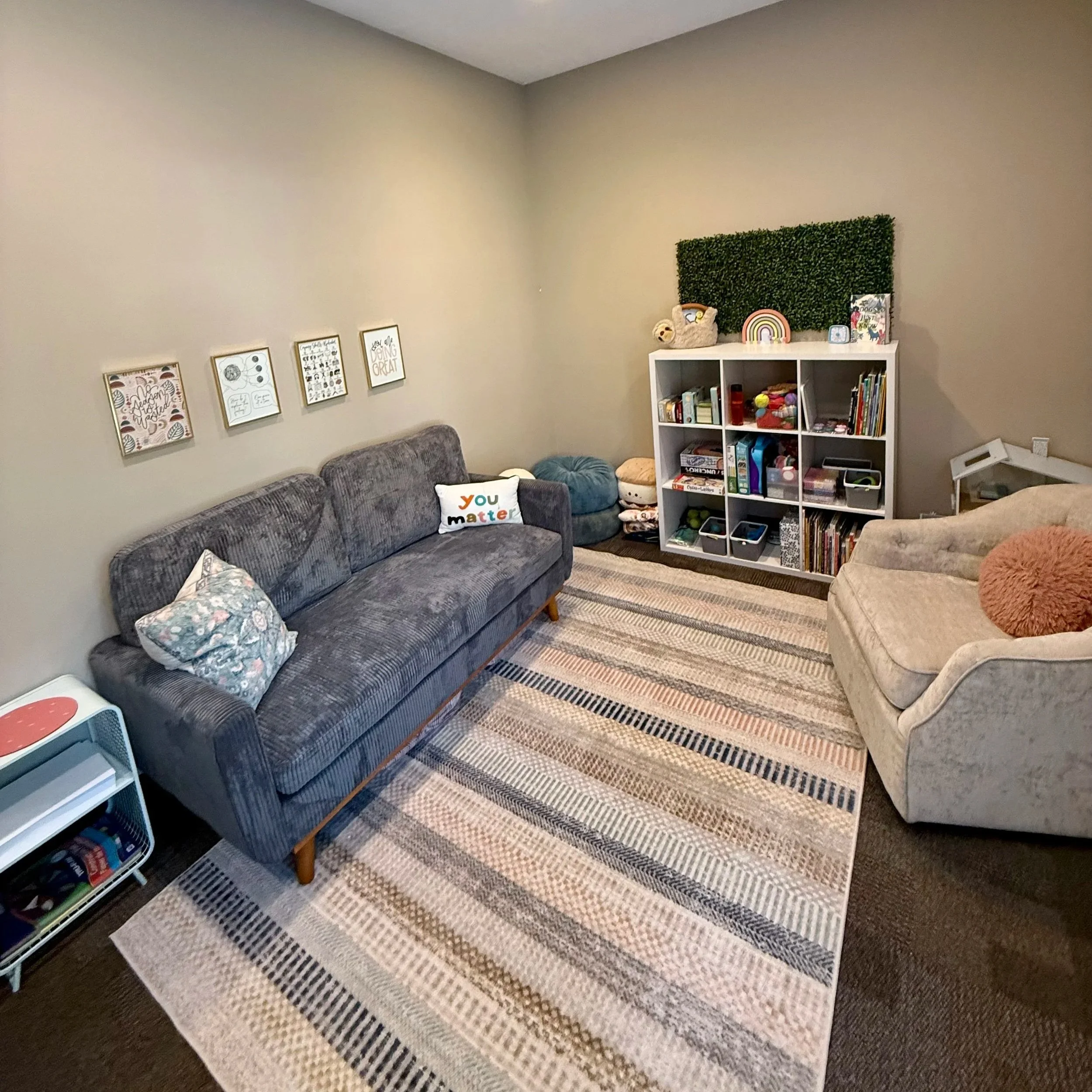 The Counseling Corner's office space with two couches
