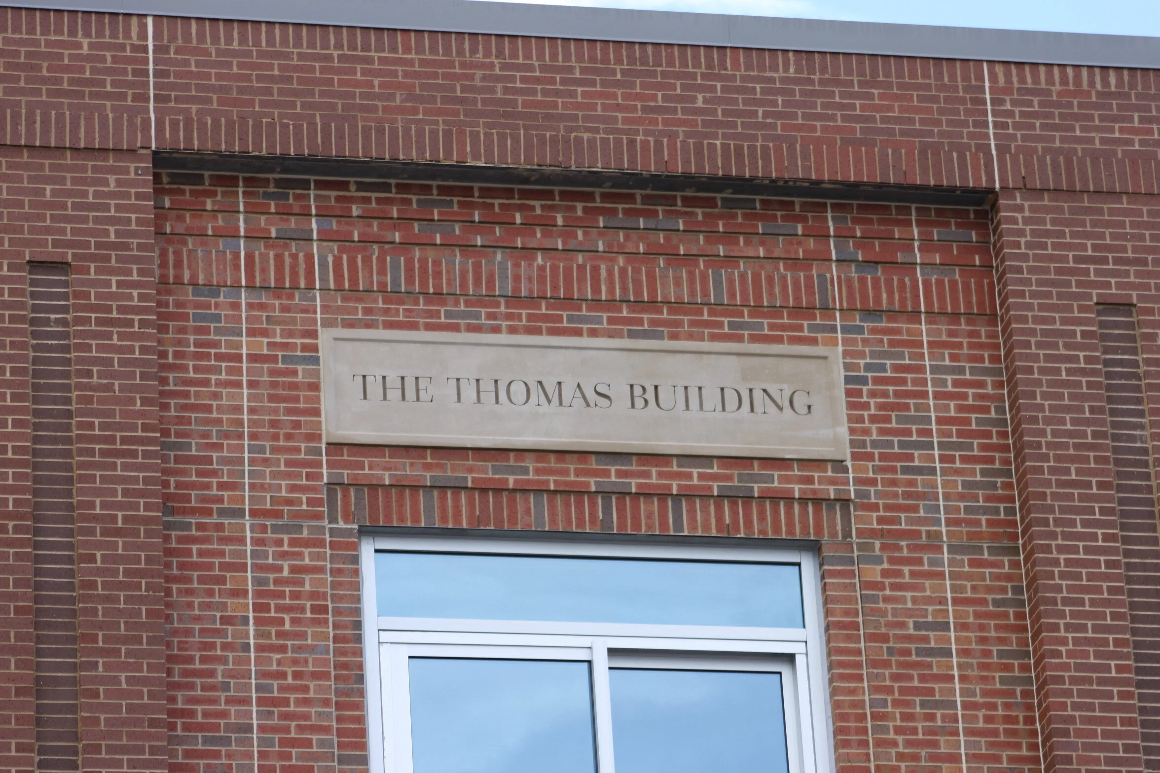 Thomas Building sign with brick detail.JPG
