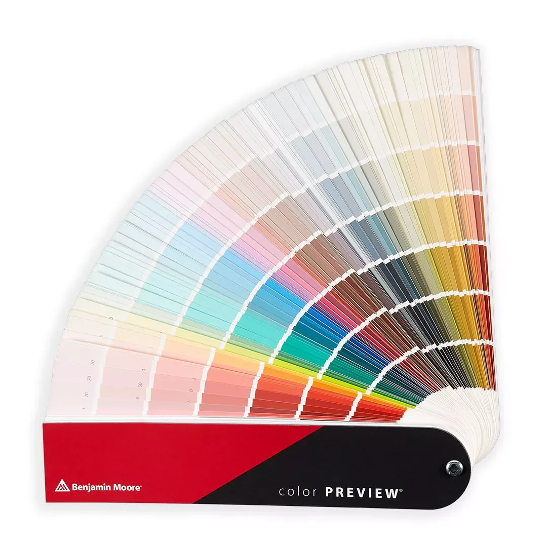 A Benjamin Moore colour preview fan deck with thousands of colours displayed on a white background