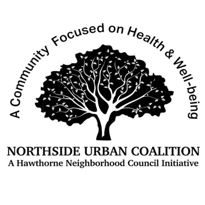 Black and white logo with a large tree, with the text "A Community Focused on Health & Well-being" curved above the tree. Below, it reads "NORTHSIDE URBAN COALITION" and "A Hawthorne Neighborhood Council Initiative."