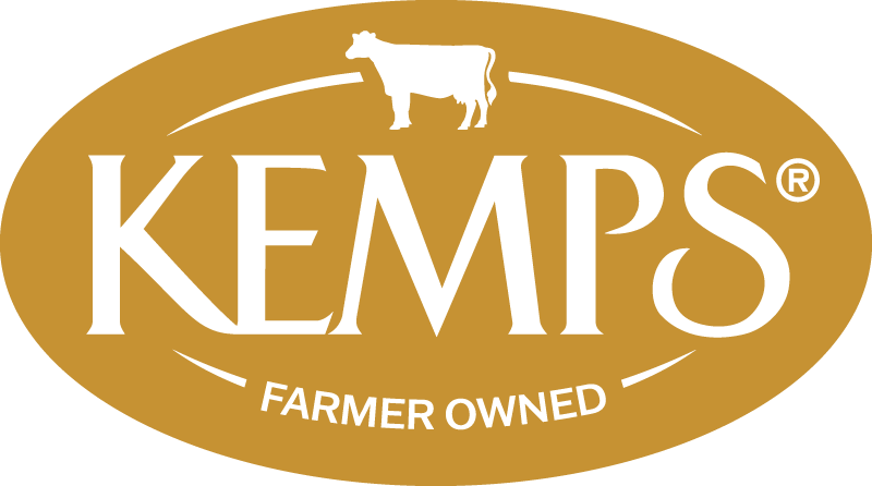 Kemps logo with a white cow on a gold oval background and the text "Kemps Farmer Owned".