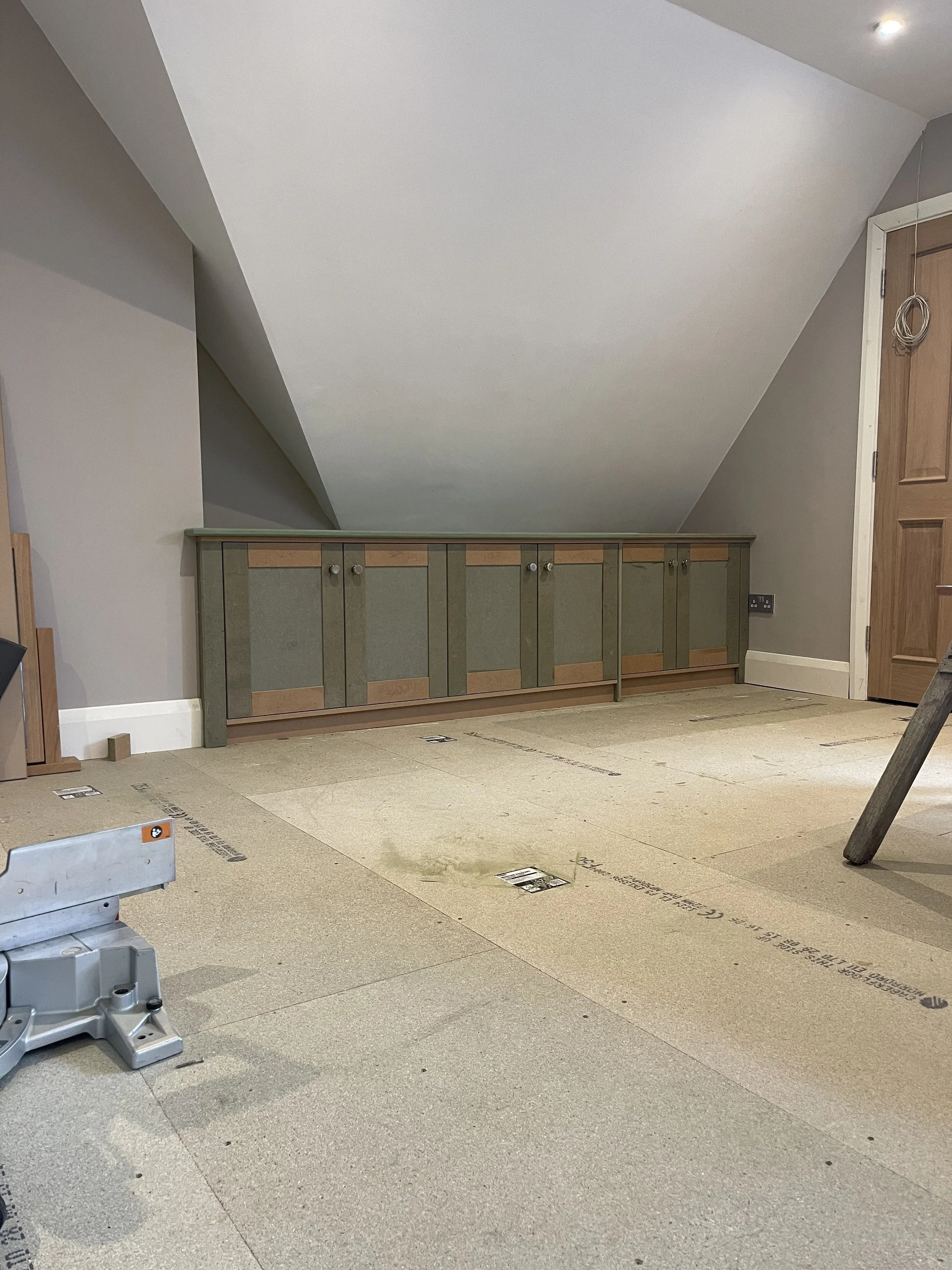 A site-built MDF sideboard unit, with shaker doors made on site