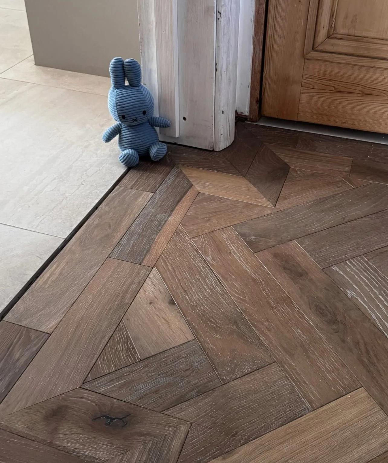 Oak Herringbone flooring, with a double boarder detail.