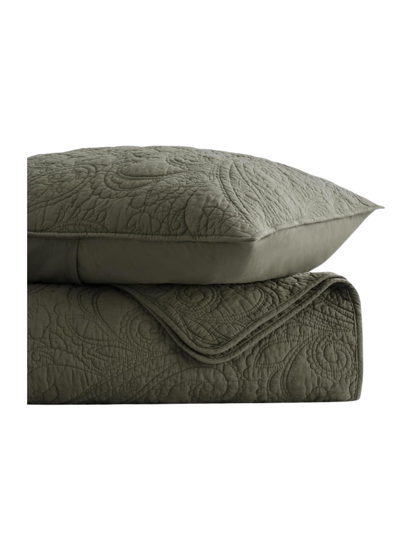 Earthy Paisley quilt set styled on a cozy, neutral bedroom bed, warm and inviting