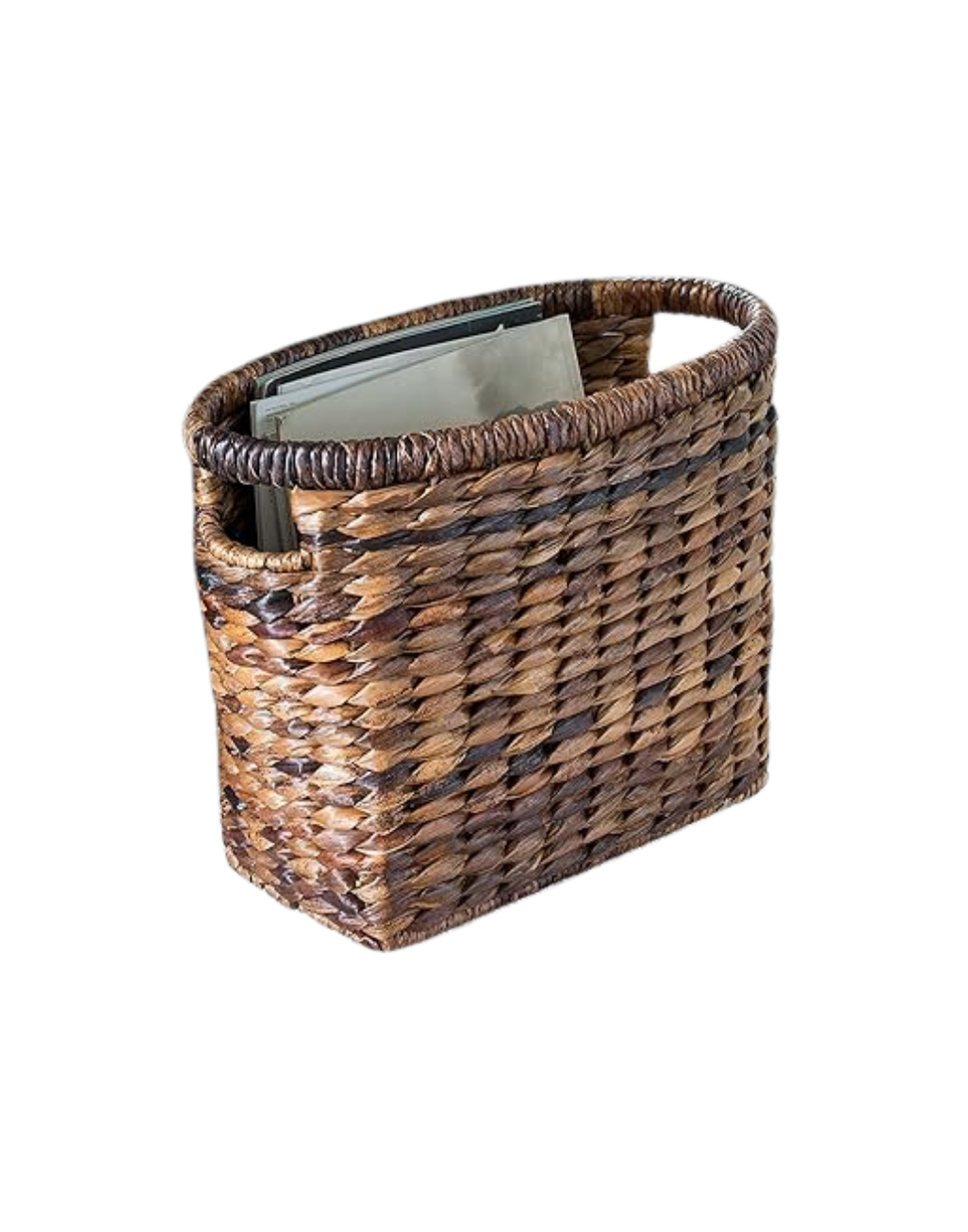 Woven wicker basket with books and notebooks inside
