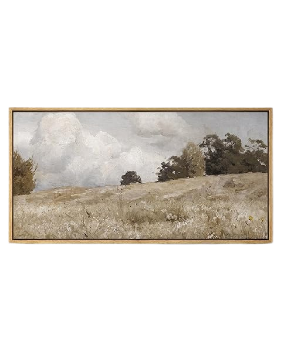 A wooden chair with a cushioned beige seat and backrest, viewed from the side.