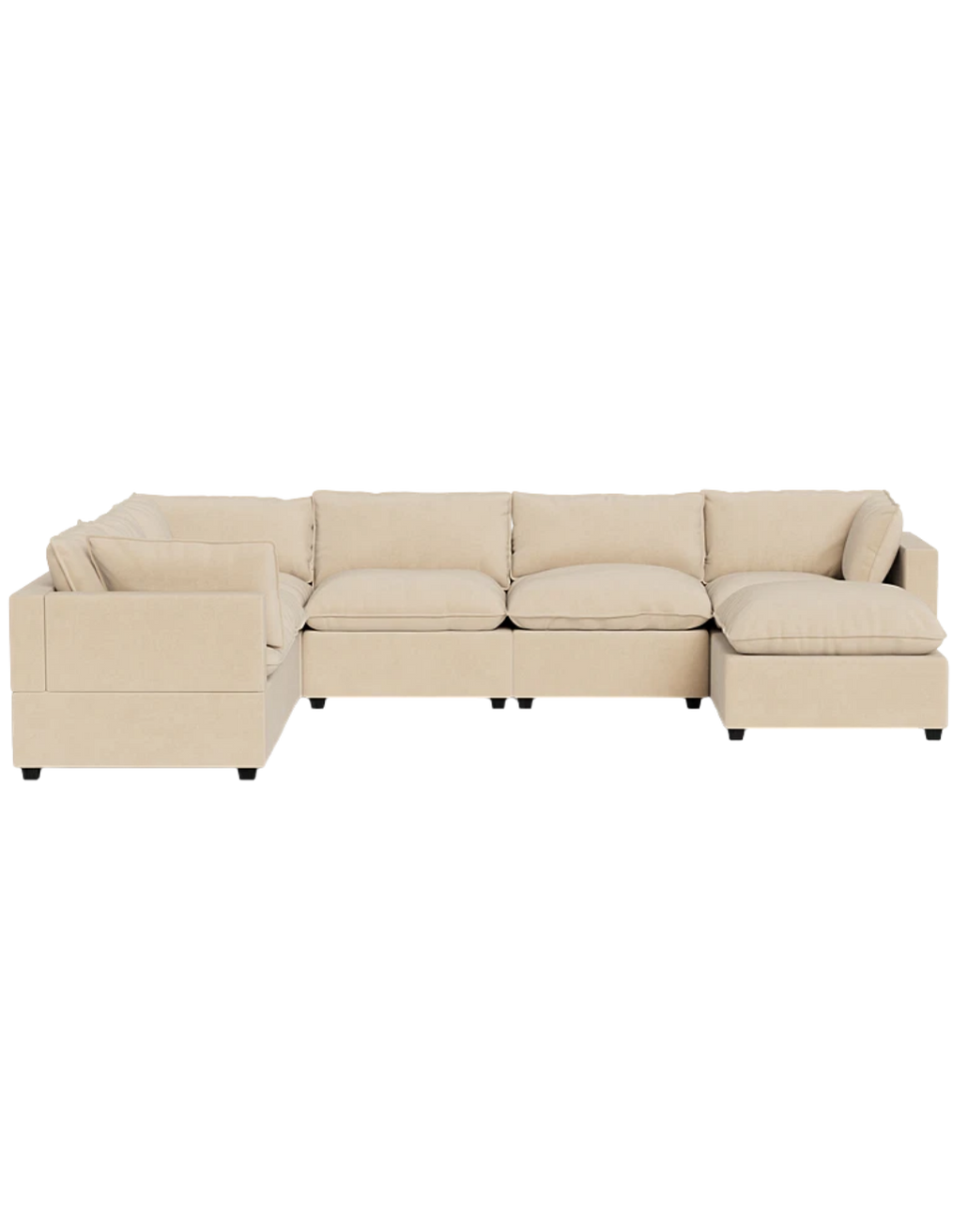 Cream-colored sectional sofa with cushions on a gray floor.