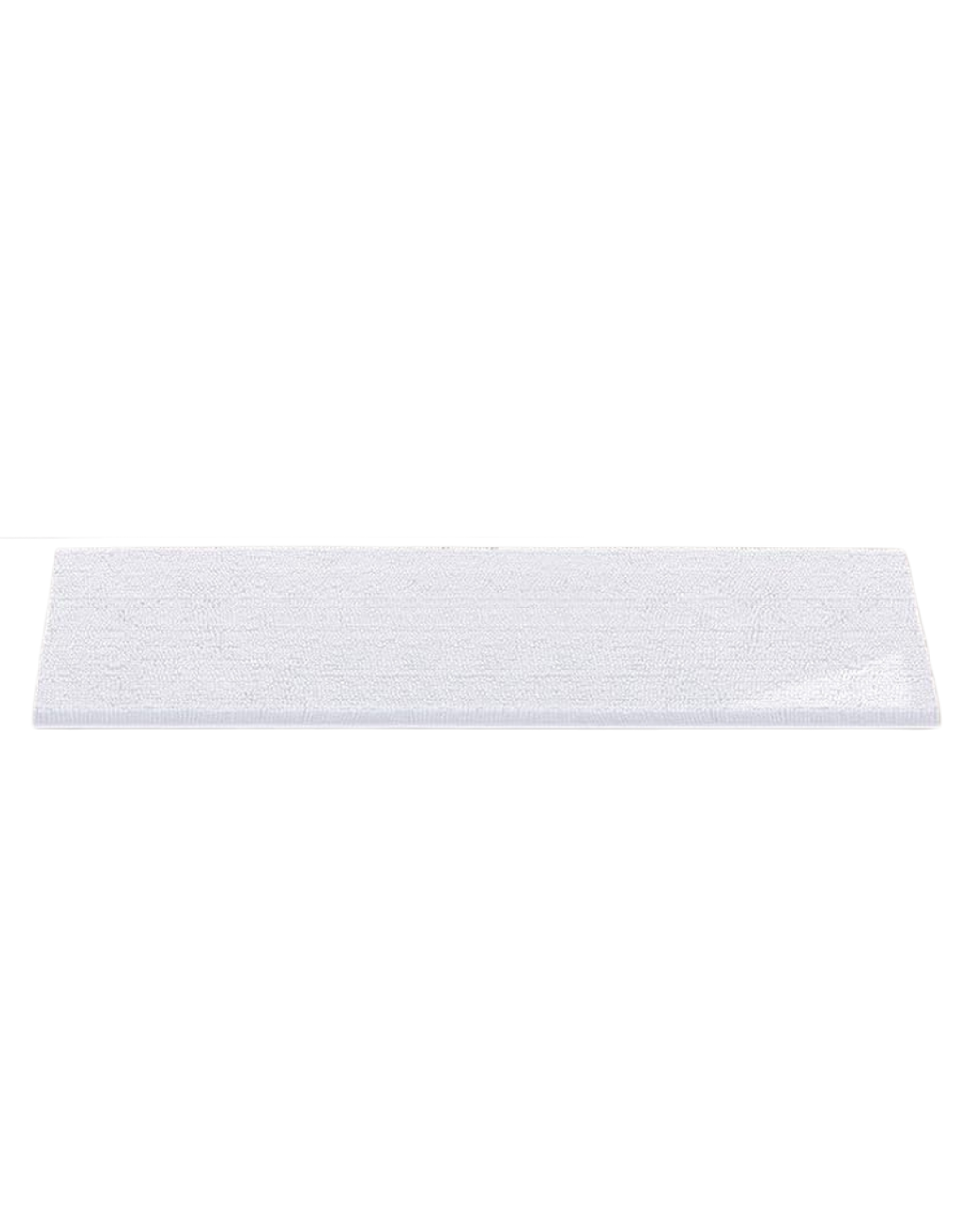 A white rectangular object with a textured surface on a black background.