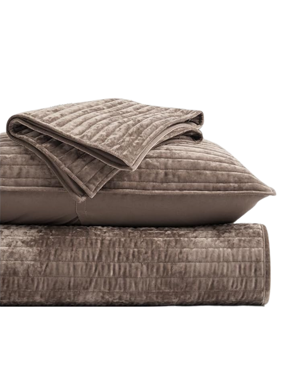 A neatly folded beige or taupe quilted blanket placed on a matching bedspread, with additional folded blankets on top, all on a bed.