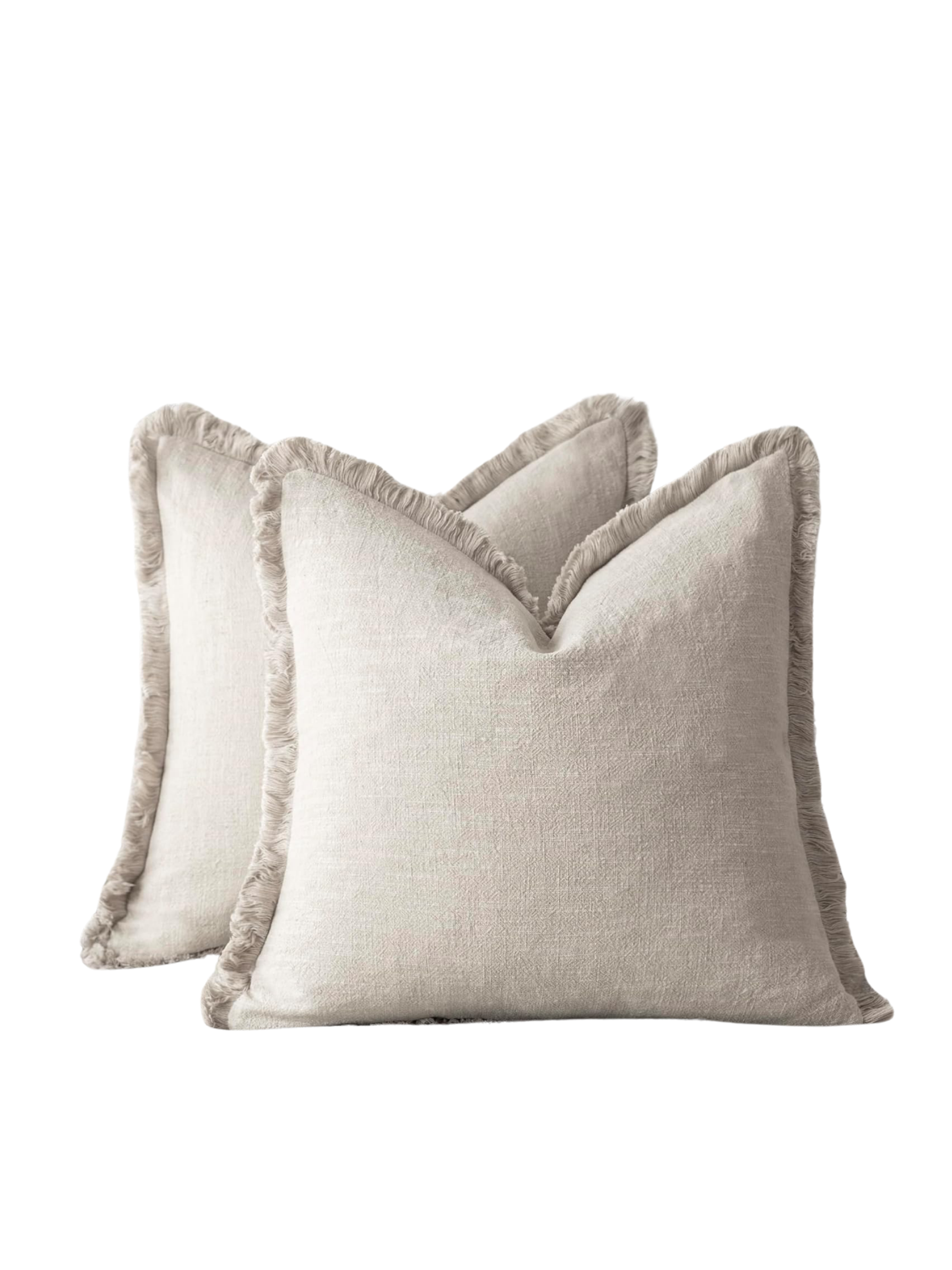 Natural linen throw pillow with fringe detailing, styled on a bed and sofa.