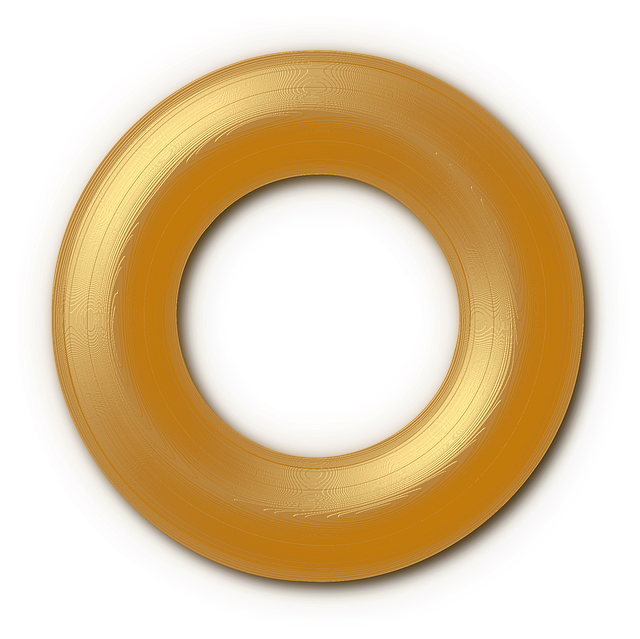 Ein goldener, kreisförmiger Gegenstand mit einem schwarzen Loch in der Mitte.