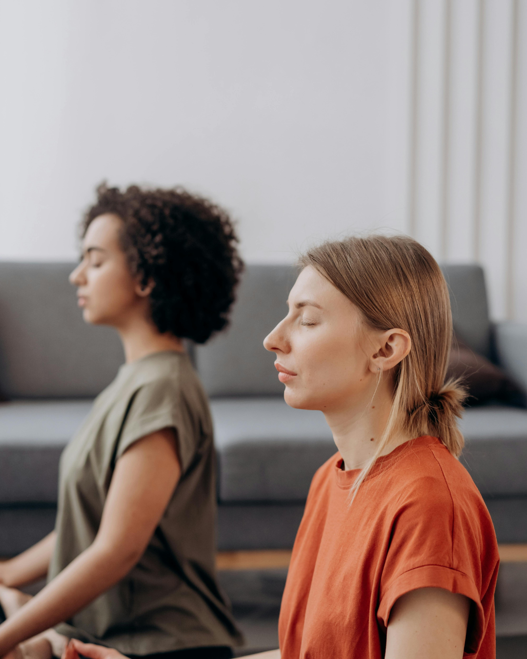 Small group participating in a restorative wellness workshop designed to support burnout recovery, reflection, and nervous system regulation.