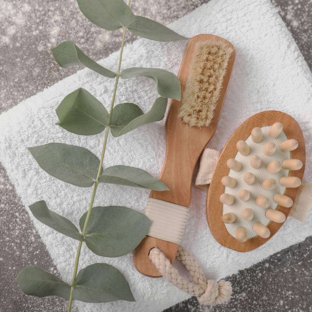 a calming image of a eucalyptus branch with a dry brush and self-care