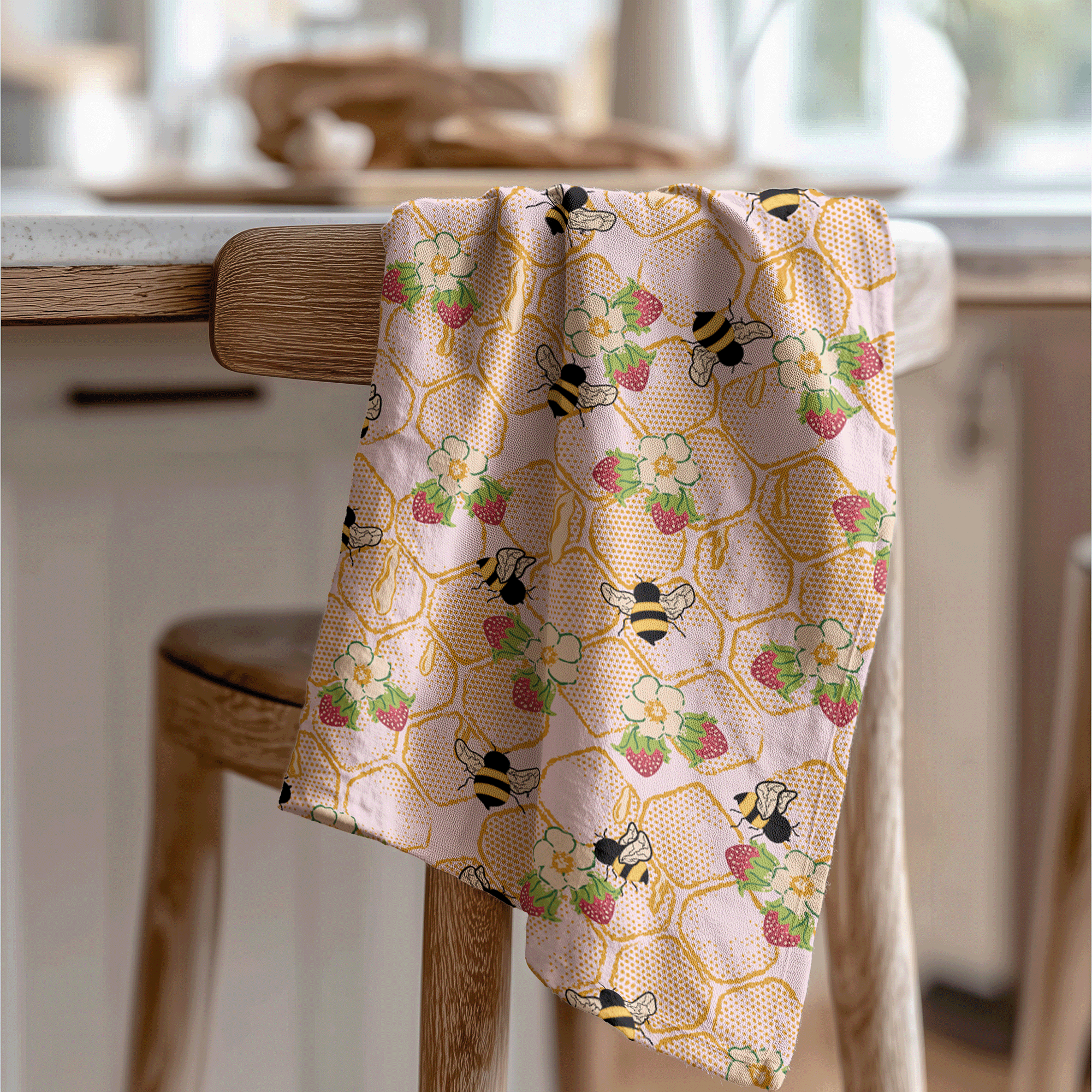 Honeycomb surface pattern design with bees and blossoms, featuring a softly worn, vintage-inspired texture, shown as a kitchen tea towel.