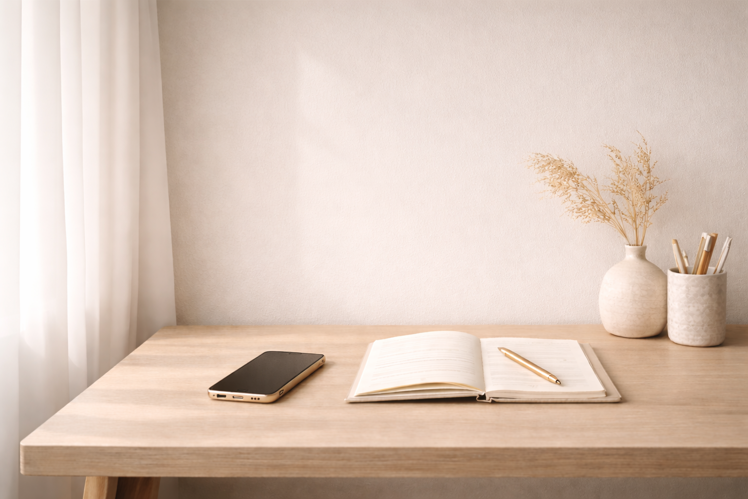 Calm workspace with notebook and pen representing reflection and therapy at InnSight Therapy