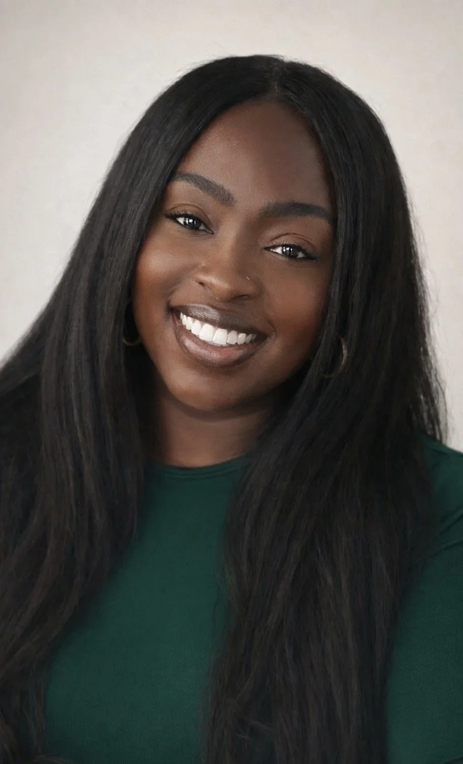 Carrin Adoma, registered social worker and psychotherapist offering virtual therapy across Ontario and in-person sessions in Burlington.