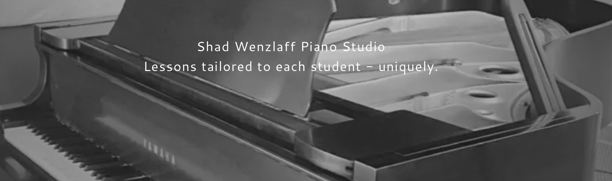 Black and white image of a grand piano with a music sheet stand, with the text 'Shad Wenzlaff Piano Studio - Lessons tailored to each student - uniquely' overlaid.