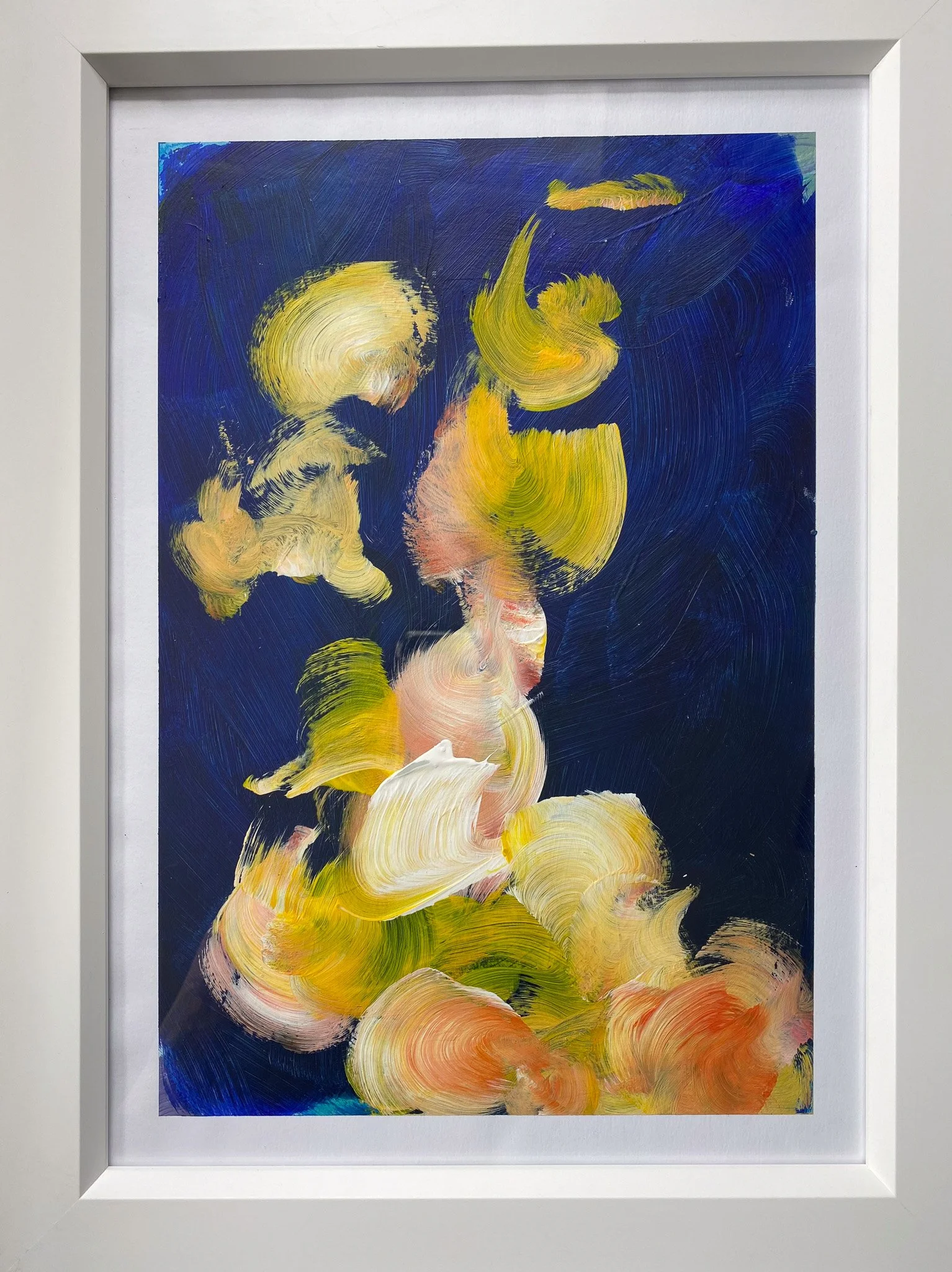 Abstract painting with swirling strokes of yellow, white, peach, and green on a dark blue background.