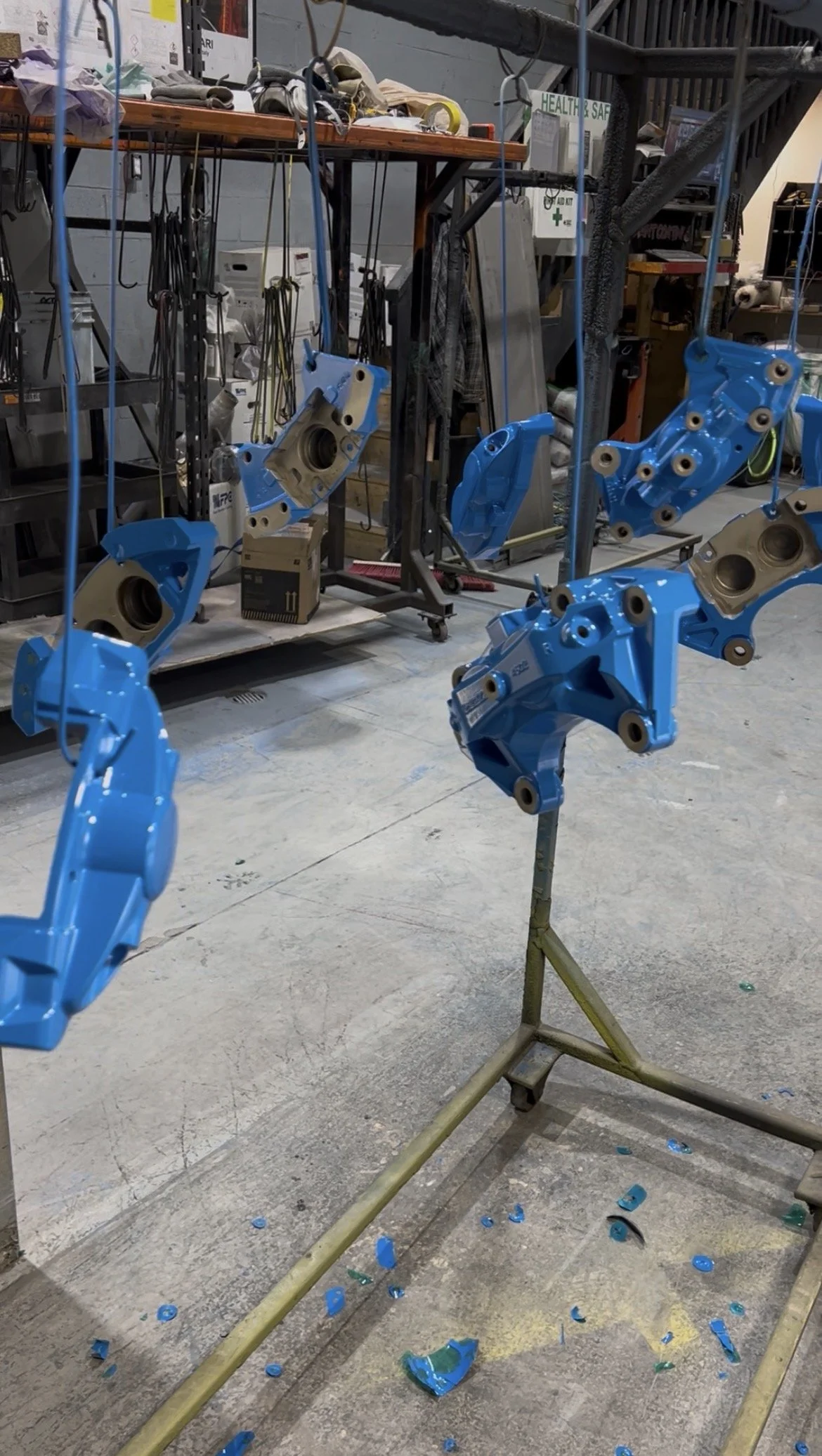 Brake Calipers powder coated in blue after it was dissassembled, prepped, tapped, and powder coated.